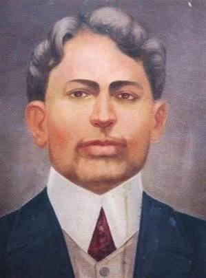 Painted colour portrait of Madan Lal Dhingra in a dark jacket and high white collar.